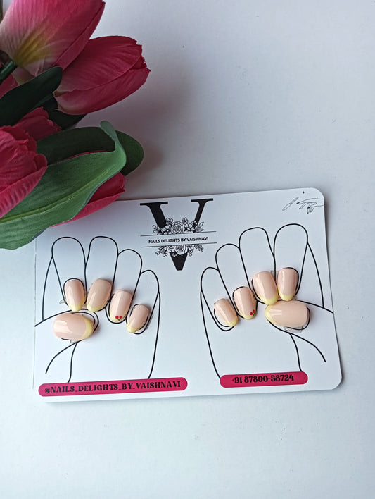 Peachy Yellow French Tip Press-On Nails with Heart Accent